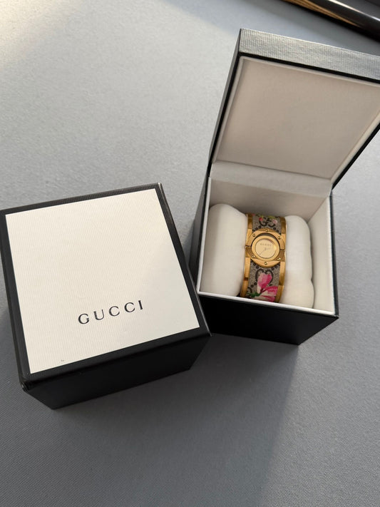 Gucci Ladies Bloom Twirl Gold Plated Bangle Style Watch