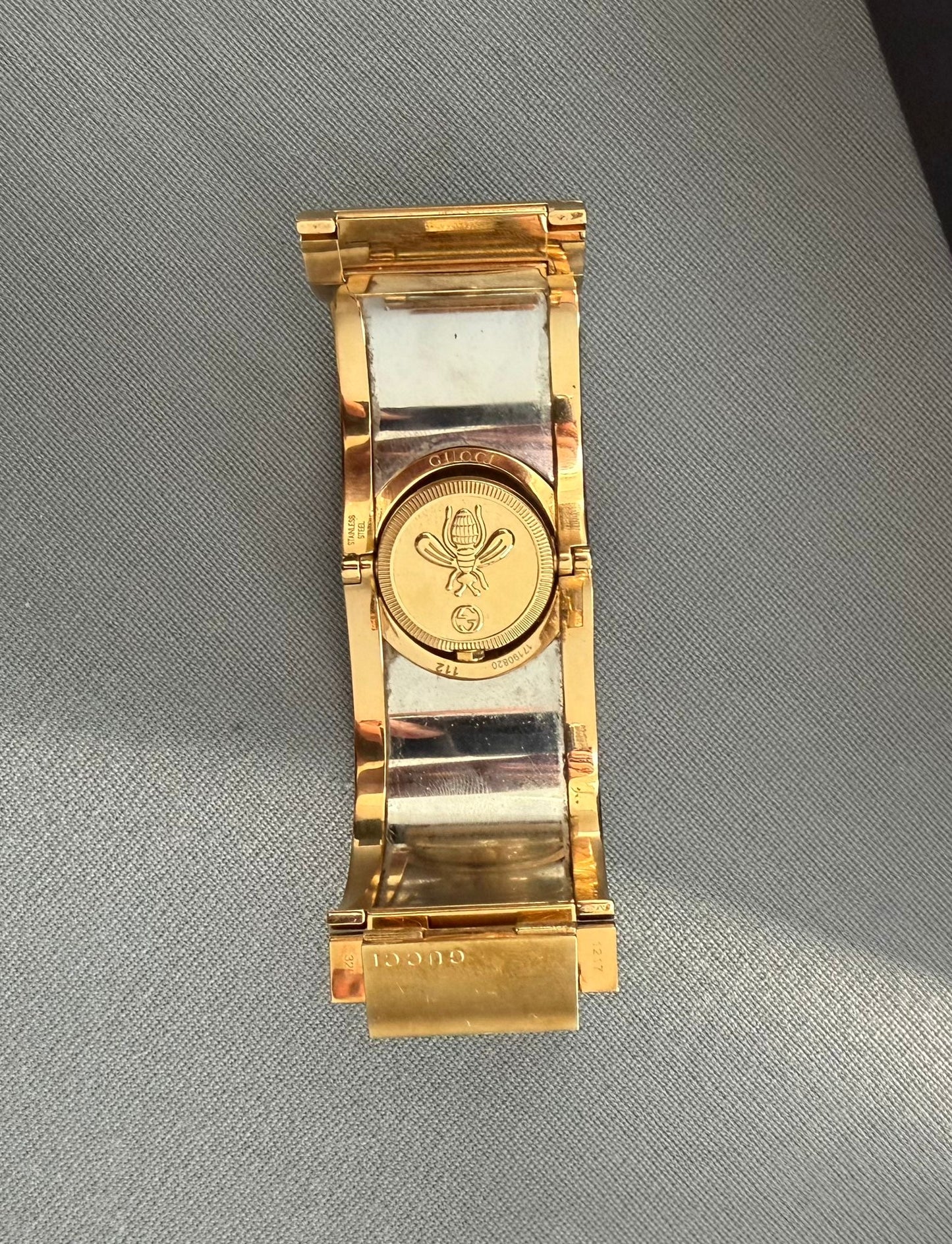 Gucci Ladies Bloom Twirl Gold Plated Bangle Style Watch