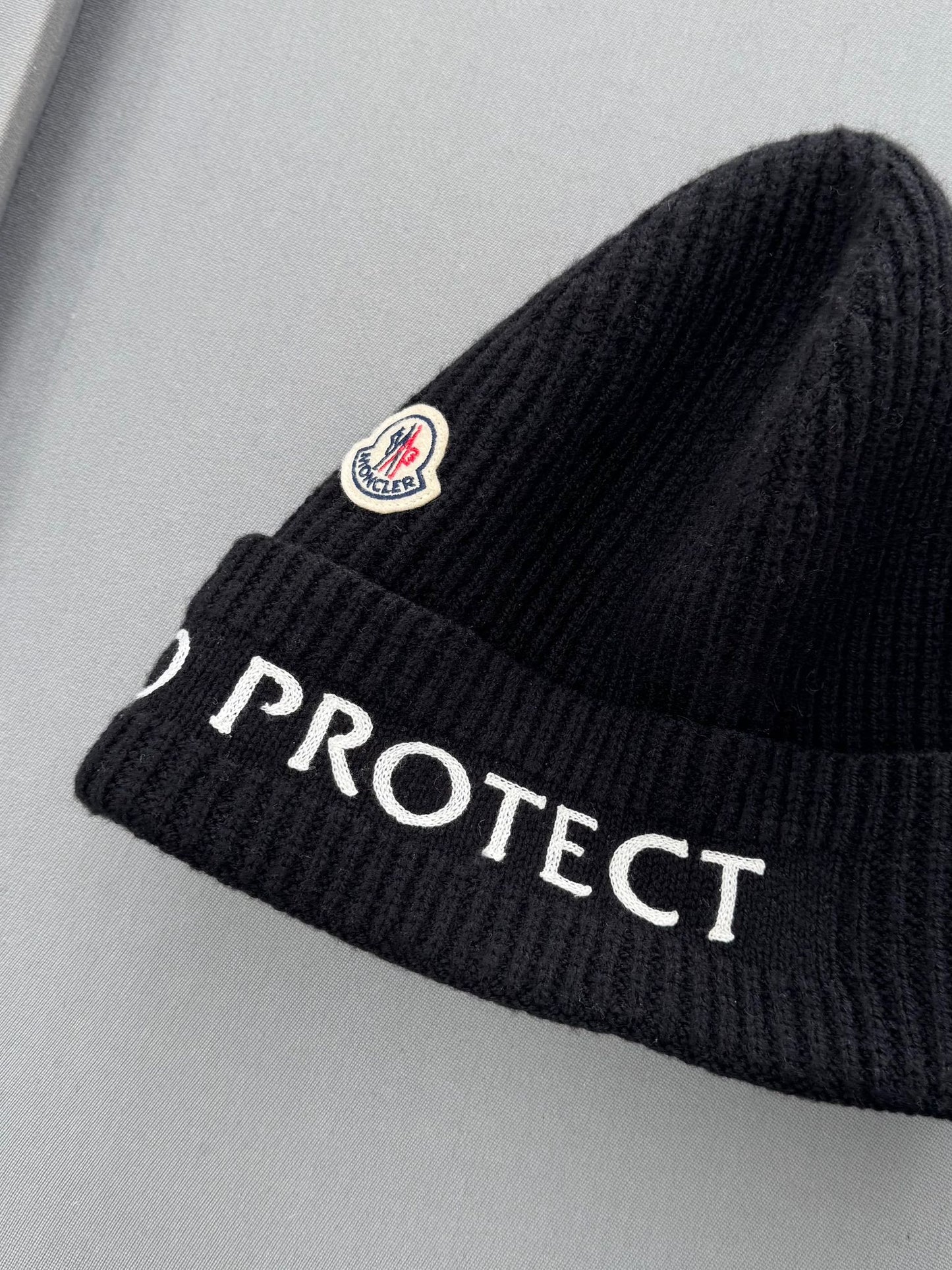 Moncler Black “ Born To Protect “ Tricot Wool Beanie
